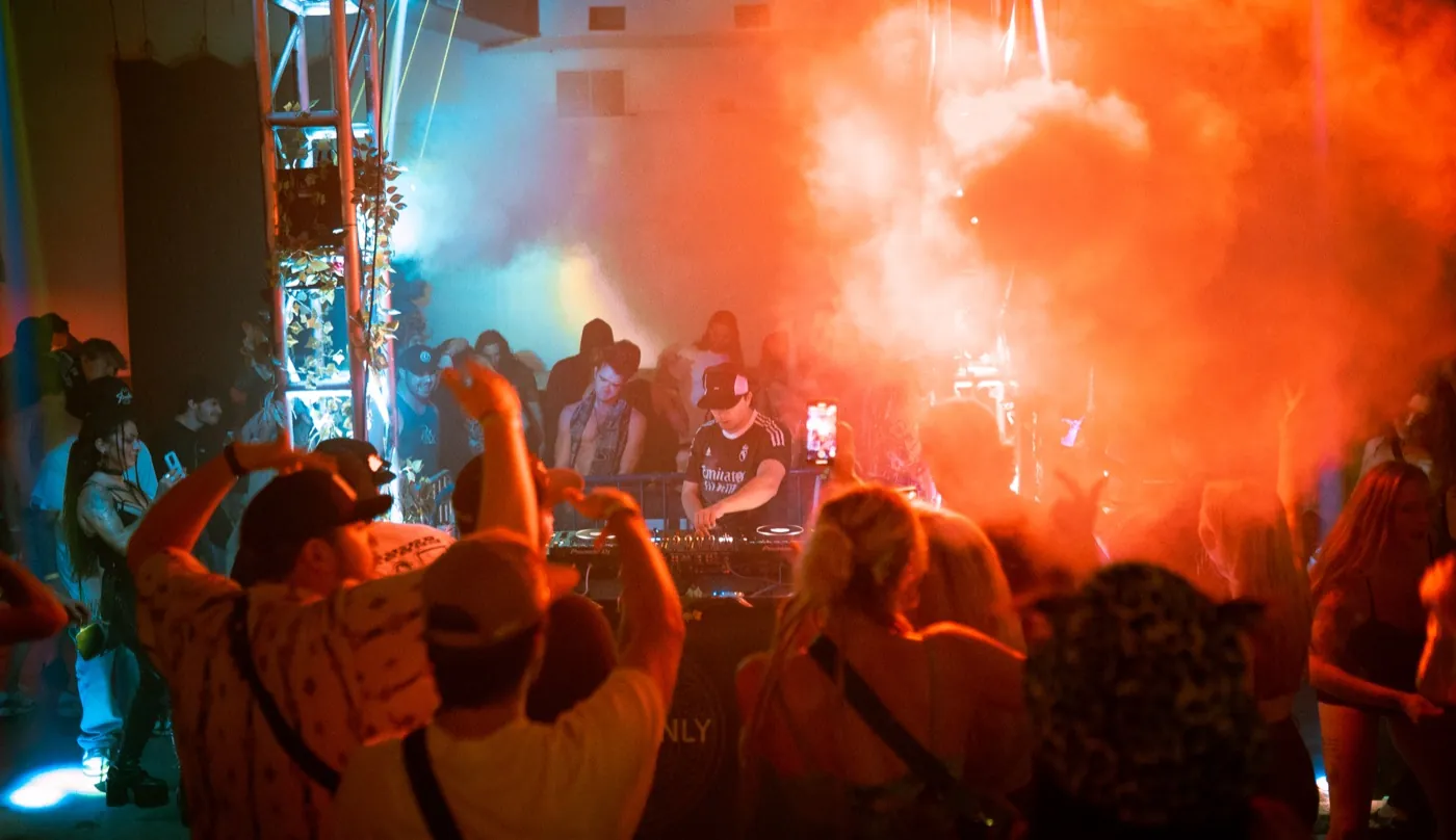 DJ booth at an Underground Garden warehouse night set