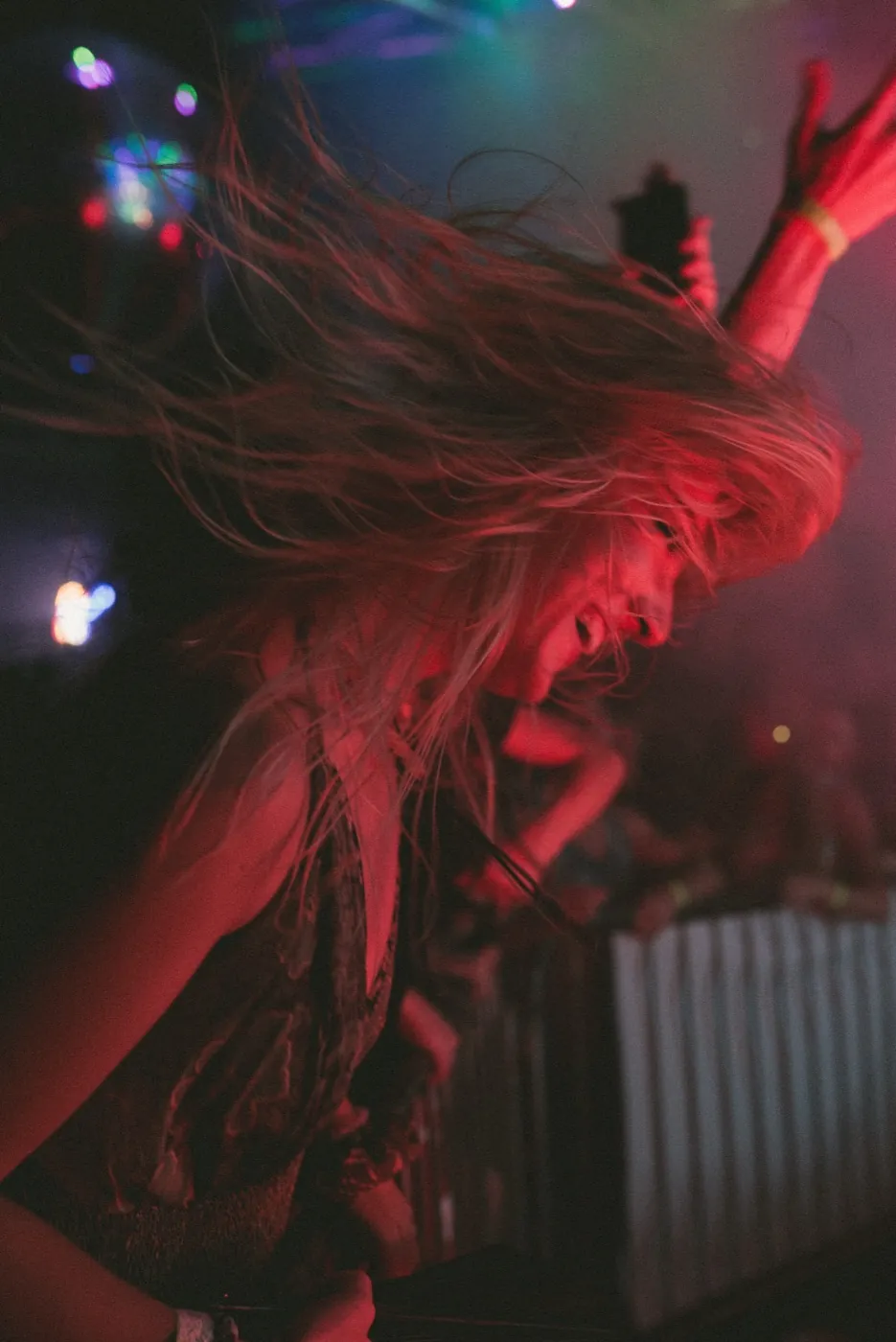 Underground Garden crowd headbanging under red stage lighting