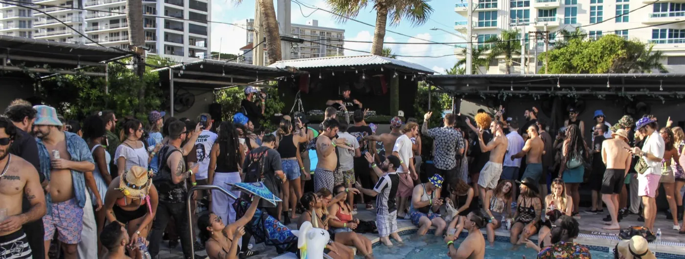 Underground Garden pool party crowd with DJ booth