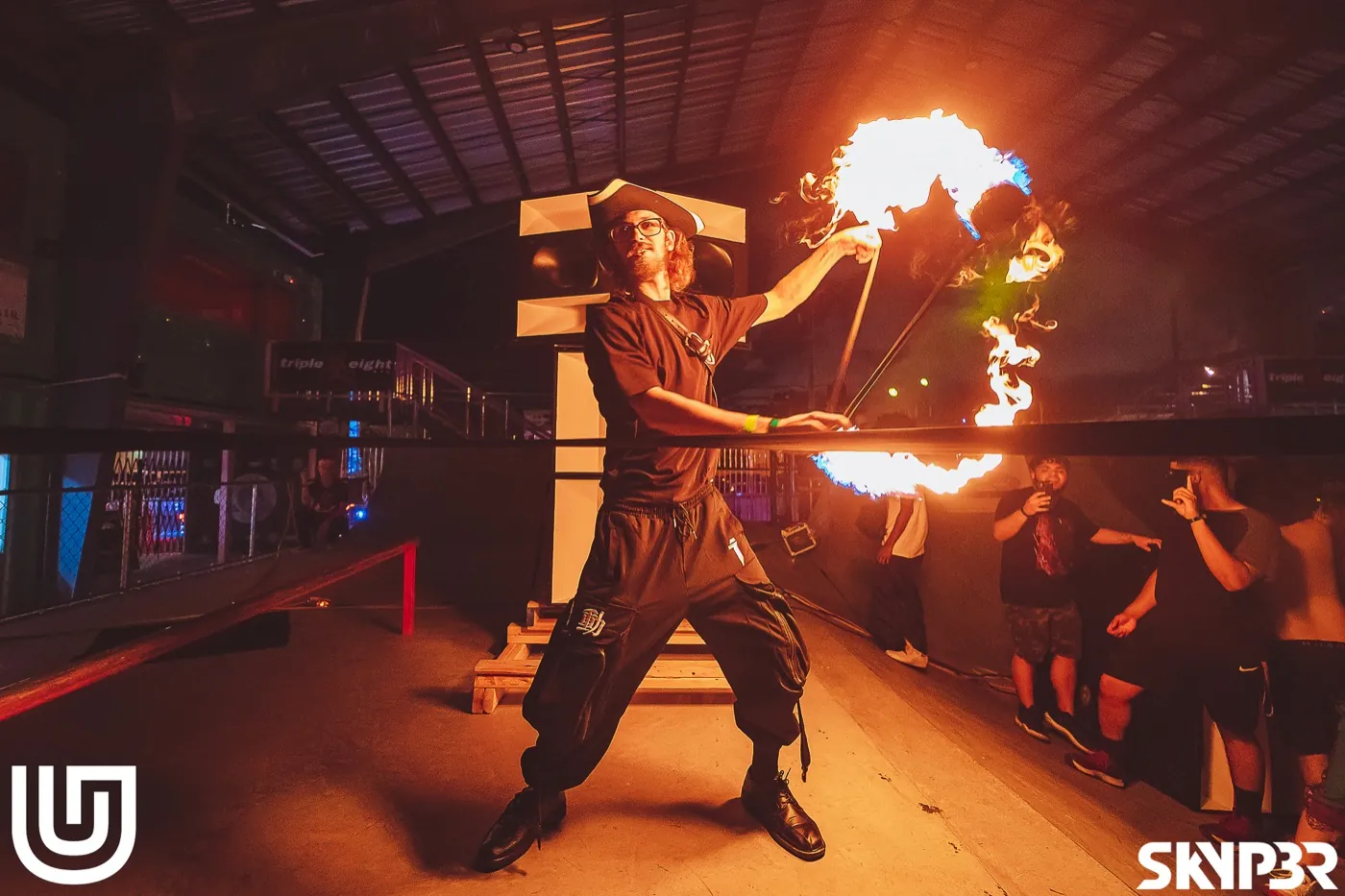 Fire performer at an Underground Garden night event