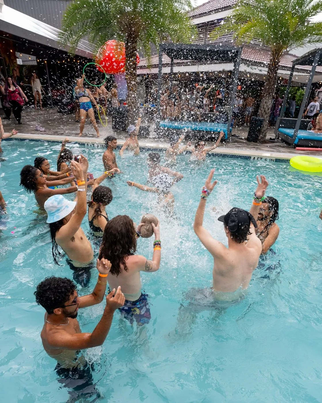 Underground Garden pool party crowd splashing in the pool