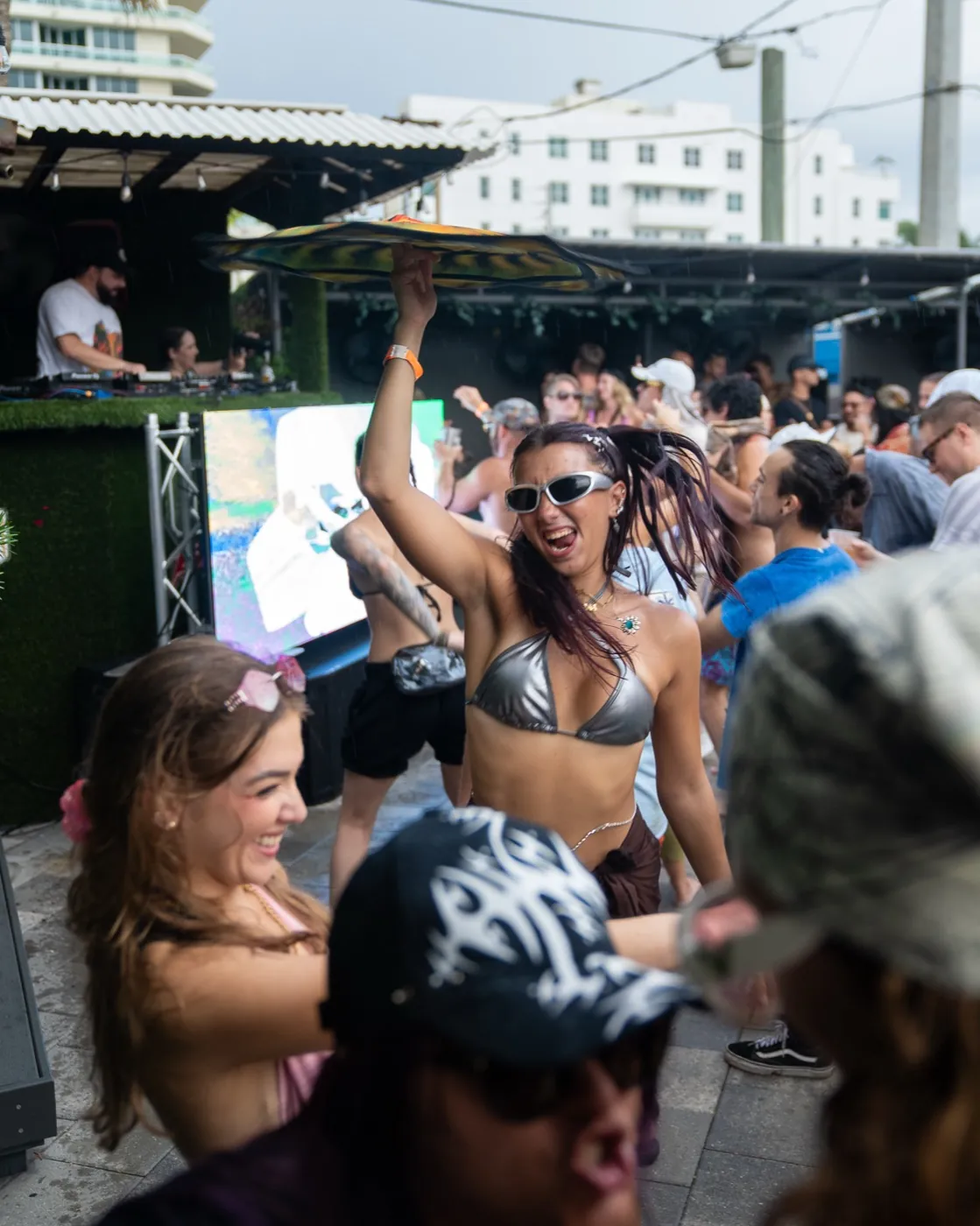 Underground Garden pool party — dancing in the rain on the rooftop deck